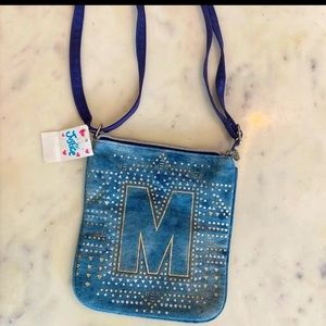 Justice. Girl purse. “M” NEW with tag